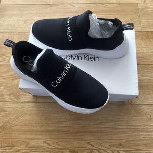 Calvin Klein Black and White Slip-On Shoes